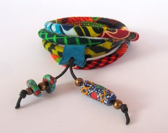 PatchWork bracelet - Wrap Bracelet /Necklace - African fabric - Leather Charm With Crobo Beads