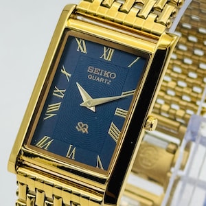 Vintage Seiko Slim Tank Quarz Herren Gold Armbanduhr Gold Zifferblatt (Kostenloser Versand)