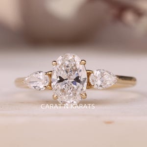 1.50 Carat IGI Certified EF/VVS Oval Cut Lab Created Three Stone Diamond Engagement Ring, Pear Cut Side Diamonds, 14k Yellow Gold