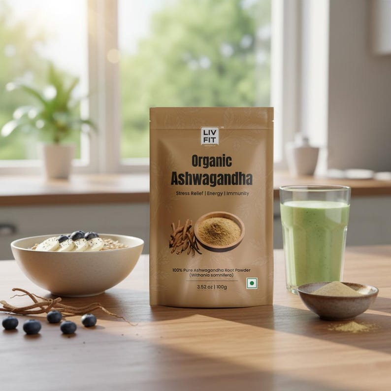 May include: A brown pouch of "Organic Ashwagandha" powder, with text and a bowl of powder, a bowl of oatmeal with blueberries and banana slices, and a green smoothie in a glass. The pouch is 3.52 oz (100g).