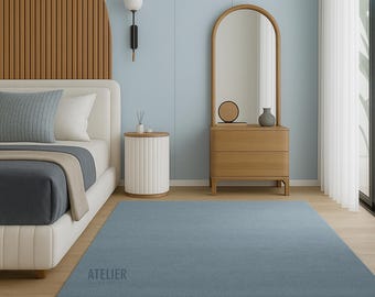 Hand-Tufted Light Blue Wool Area Rug: Solid Color, Soft Pile