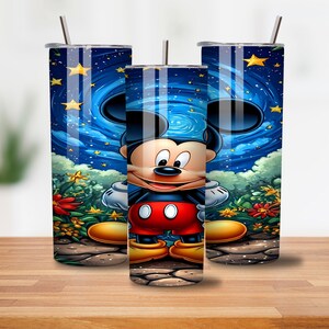 May include: Three tall, cylindrical tumblers with a Mickey Mouse design. The design features Mickey Mouse in front of a starry night sky with clouds and flowers. Each tumbler has a silver straw and a lid.