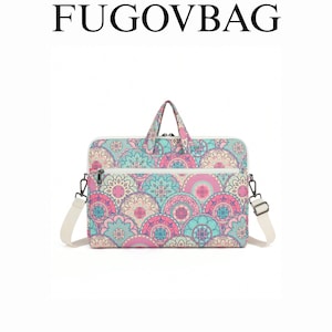 Pode incluir: Bolsa para laptop com um padrão floral colorido em tons de rosa, azul e branco. A bolsa tem uma alça superior, uma alça de ombro e um bolso frontal com zíper. O texto "FUGOVBAG" está no topo.