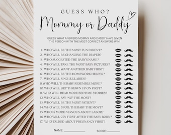 May include: A white baby shower game card with the text "Guess Who? Mommy or Daddy" in a decorative font. The card includes a list of questions and spaces for answers, with lip and mustache graphics.