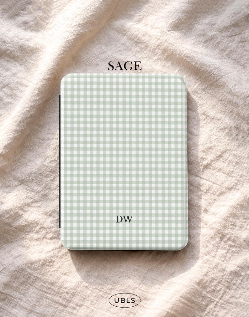 May include: A sage green and white gingham pattern case with the initials "DW". The word "SAGE" is printed at the top. The case is rectangular with rounded corners. The brand name "UBLS" is printed at the bottom.