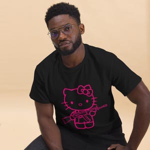 Pink Rebel Kitty Tee – Graffiti Style Hello Kitty with Gun | Kawaii Streetwear T-Shirt