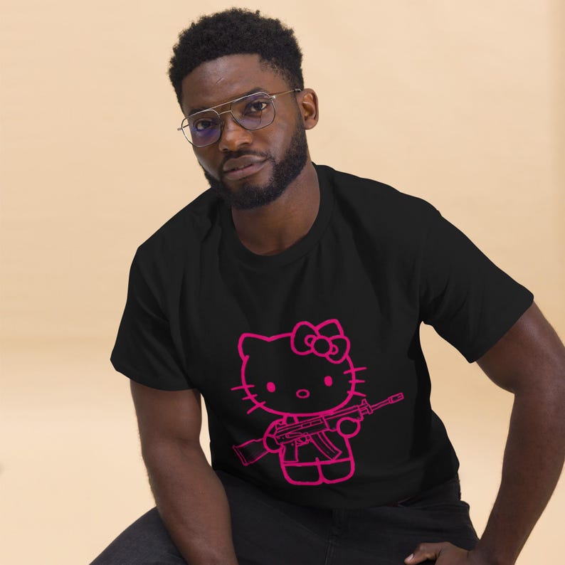 Pink Rebel Kitty Tee – Graffiti Style Hello Kitty with Gun | Kawaii Streetwear T-Shirt
