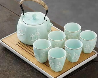 Juego de té de cerámica hecho a mano: diseño de flor de ciruelo en relieve
