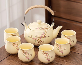 Juego de té de cerámica con flores de ciruelo pintadas a mano: estilo kung-fu chino