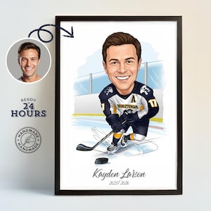 May include: Framed cartoon portrait of a hockey player in a navy and yellow uniform, holding a hockey stick and puck on the ice. The portrait includes the name "Kayden Larson" and the years "2025/2026". A smaller portrait is in the upper left corner.