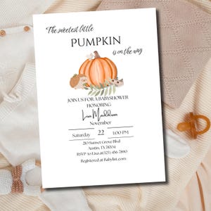May include: A baby shower invitation with a pumpkin illustration and the text "The sweetest little PUMPKIN is on the way." The invitation includes details for a baby shower honoring Lisa Maddison.