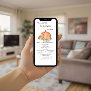 May include: A smartphone displays a baby shower invitation with a pumpkin theme. The invitation features an orange pumpkin, hedgehogs, and text that reads "The sweetest little PUMPKIN is on the way." Details include the date, time, and location.