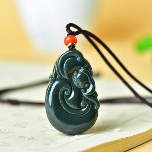 Carved Dark Green Jade Ruyi Pendant, Stylized Cloud Motif with Orange Bead and Gold Accent, Peaceful Blessing Jewelry Gift for Women