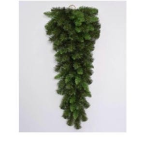 May include: A dark green artificial hanging plant, resembling a cascading evergreen branch. The plant is densely packed with needle-like leaves, creating a full and textured appearance. It is designed for wall decor and adds a touch of nature to any space.