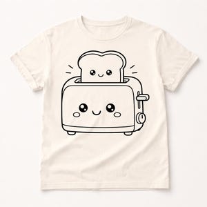 Puede incluir: Camiseta de color crema con una ilustraci&oacute;n de dibujos animados en blanco y negro de una tostadora sonriente con una rebanada de pan. La tostadora y el pan tienen caras lindas y expresivas. El dise&ntilde;o es simple y juguet&oacute;n.
