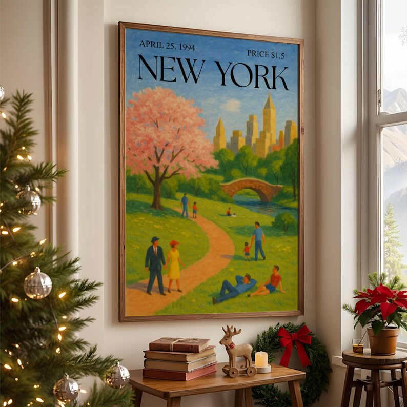 May include: A framed print of a New York scene, featuring a park with a path, bridge, and cityscape. The artwork has a blue sky and a pink flowering tree. Text at the top reads "April 25, 1994" and "New York".