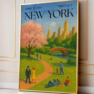 May include: Framed art print of a New York City scene from April 25, 1994. The artwork depicts a park with a path, bridge, and cityscape in the background. A large pink flowering tree is on the left, and people are enjoying the park.
