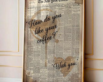 May include: Framed print featuring a vintage New York Times newspaper background. The print includes coffee stain art and the text "How do you like your coffee? With you." The frame is gold.