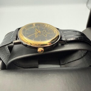 Carls Jr Armbanduhr Gold-Ton Schwarz Lederarmband Stern-Logo Analog Quarz Time Corp Bild 8