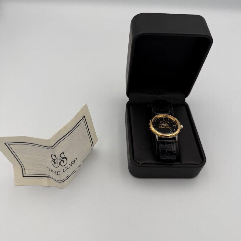 Carls Jr Armbanduhr Gold-Ton Schwarz Lederarmband Stern-Logo Analog Quarz Time Corp Bild 3