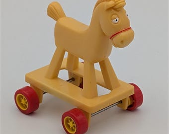 Juguete rodante de Fozzie Bear y caballo de los Muppet Babies de McDonald's, vintage, 1986 (repuesto)