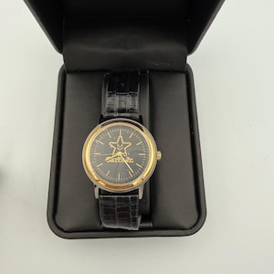 Carls Jr Armbanduhr Gold-Ton Schwarz Lederarmband Stern-Logo Analog Quarz Time Corp Bild 1