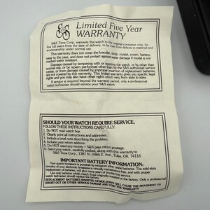 Carls Jr Armbanduhr Gold-Ton Schwarz Lederarmband Stern-Logo Analog Quarz Time Corp Bild 12