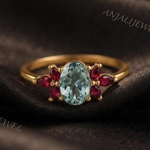 Nature-Inspired Aquamarine Flower Ring, 14K Gold Oval Blue Center Stone with Marquise Ruby Petals, Unique Engagement Band