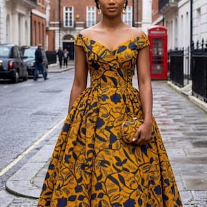 navy blue and mustard dress Navy Blue & Yellow Panelled Embroidered Dress -