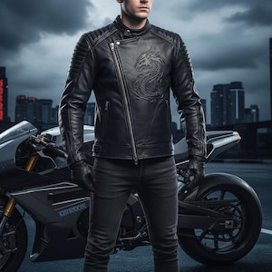 May include: Black leather jacket with a dragon design on the chest, featuring a diagonal zipper and quilted shoulder detailing. The jacket is paired with black gloves and jeans. A motorcycle is visible in the background.