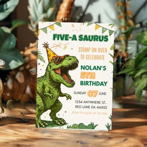 May include: A birthday invitation with a green dinosaur wearing sunglasses and a party hat. The invitation reads "FIVE-A SAURUS" and includes the text "Nolan's 5th Birthday" with the date and address.