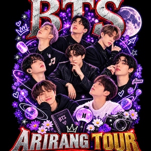 May include: A graphic print featuring seven individuals in black attire, with the text BTS at the top and ARIRANG TOUR at the bottom. The design includes purple cosmic elements, a moon, stars, flowers, a light stick, a camera, and a notebook.