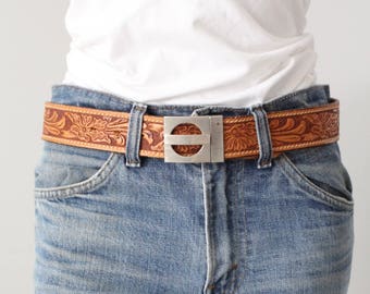 vintage 70s tooled leather belt with geometric buckle belt
