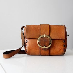 vintage 60s leather hippie bag, hand-crafted shoulder bag with brass buckle