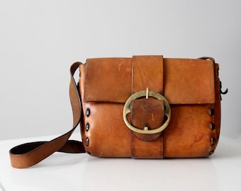 vintage 60s leather hippie bag, hand-crafted shoulder bag with brass buckle