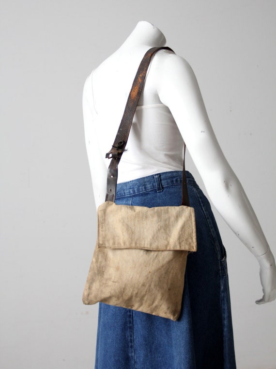 vintage leather and textile messenger bag