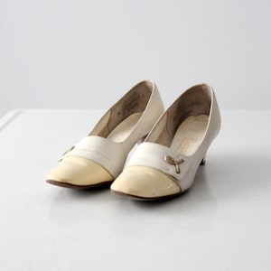vintage 60s Naturalizer white leather pumps, size 7.5 narrow