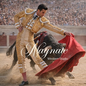 May include: A bullfighter in a gold and beige suit with detailed embroidery confronts a black bull in a bullring. The bullfighter holds a red cape, with the text "Magnate Western Studio" in the image.