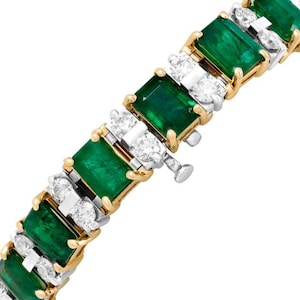 Elegant Emerald And Diamond Bracelet Crafted in 14K Yellow Gold Features Vibrant Green Emeralds Paired With Sparkling Diamonds Bracelet