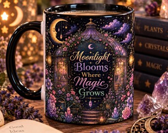 May include: A black ceramic mug featuring a colorful illustration of a garden archway under a crescent moon and stars. The text "Moonlight Blooms Where Magic Grows" is printed in the center. The design includes purple and pink flowers and crystals.