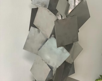 Sculpture moderne en acier inoxydable – fabriquée à la main