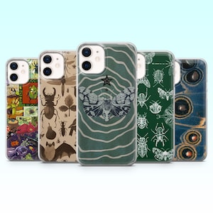 May include: A collection of five phone cases with insect-themed designs. The cases feature various illustrations of beetles, moths, and butterfly wings in a range of colors, including green, brown, and blue. The cases are designed to fit a smartphone.