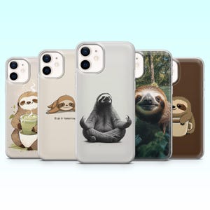 May include: A collection of five phone cases featuring sloth designs. The cases display various sloth illustrations, including a sloth meditating, a sloth with a drink, and a sloth with the text "I'll do it tomorrow". The cases have a clear or brown background.