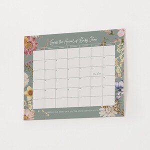 May include: A floral-themed baby shower calendar with the text "Guess the Arrival of Baby Jane." The calendar has a grid for guests to write their names and guess the due date. The border features colorful flowers.
