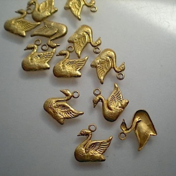 12 tiny brass swan charms ZE358