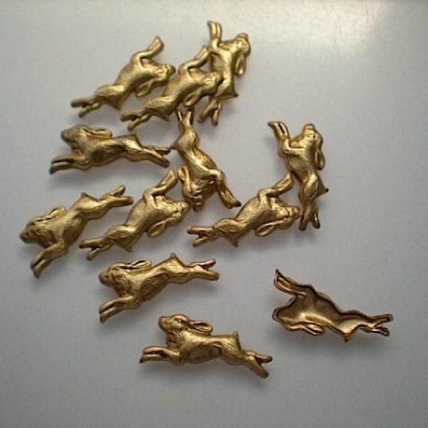 12 small brass running rabbit stampings ZE224