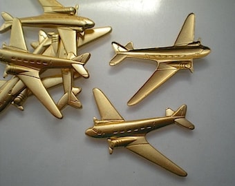 6 large brass airplane stampings ZI410
