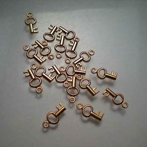 18 teeny tiny brass key charms ZH503