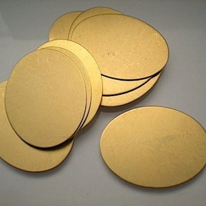 12 large flat brass oval discs/stamping blanks ZA506