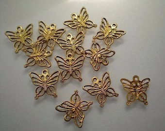 12 tiny filigree butterfly charms ZC370